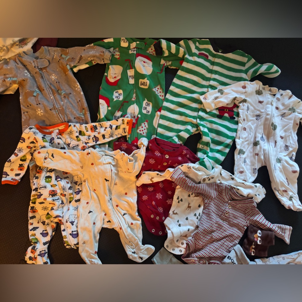 Assorted holiday footies and onesies